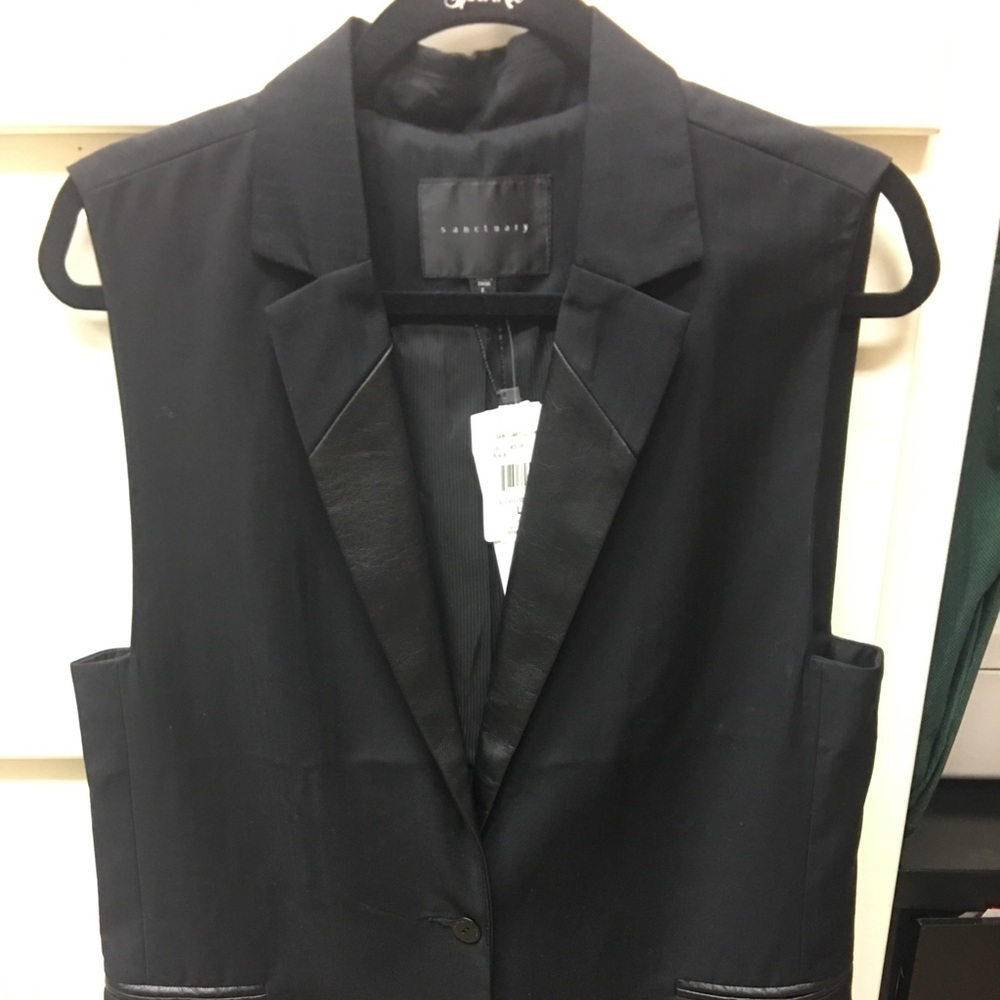 Long sleeveless vest